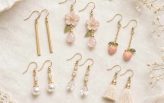 flat lay of cute dangly earrings – gold, silver, pearl and tassel styles